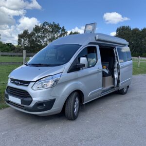 2019.04 Ford Custom Hightop LWB Conversion Outside View of Van with Sliding Door Open
