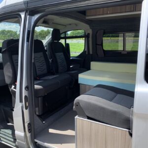 2019.04 Ford Custom Hightop LWB Conversion Seating Area with Swivelled Cab Seats