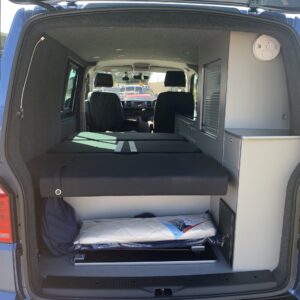 2019.08 VW T5 SWB 2 Berth Conversion Inside View with Rib Seat in Bed Position