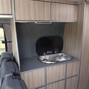 2020.07 VW Crafter LWB Conversion Kitchen Area with Lid Open on Hob/Sink