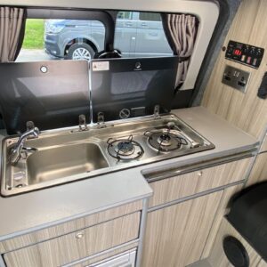 2021.08 Ford Transit Custom SWB Conversion View of Kitchen Area with Hob/Sink Lid Open