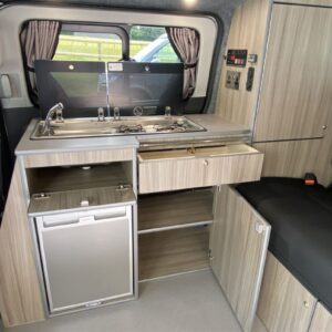 2021.08 Ford Transit Custom SWB Conversion View of Kitchen Area with Cupboards Open