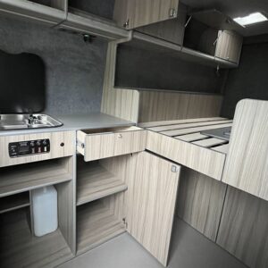2021.11 VW Crafter LWB Conversion Inside View with Storage Cupboards Open