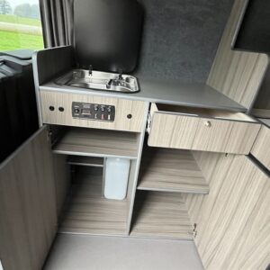 2021.11 VW Crafter LWB Conversion Inside View with Storage Cupboards Open