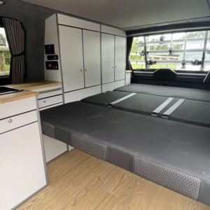 VW T6 LWB 4 Berth Conversion View of RIB Seat in Sleeping Position