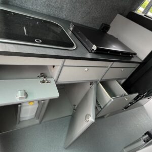 2022.05 VW T6 Rear Conversion Kitchen Area with Storage Cupboards Open