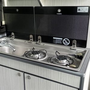 VW Crafter MWB Conversion View of Hob/Sink With Glass Lid Open
