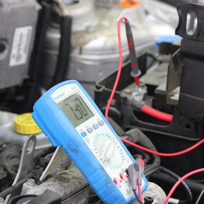Volt Meter Testing A Battery