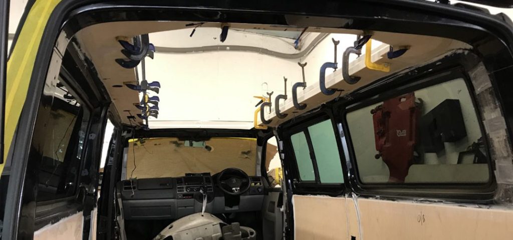 Transporter Van with SCA roof Shell Bonded and Clamped in Place