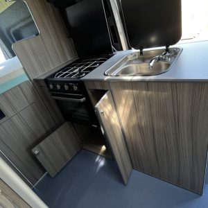 MAN TGE MWB 2 Berth Conversion Oven and Sink Opened