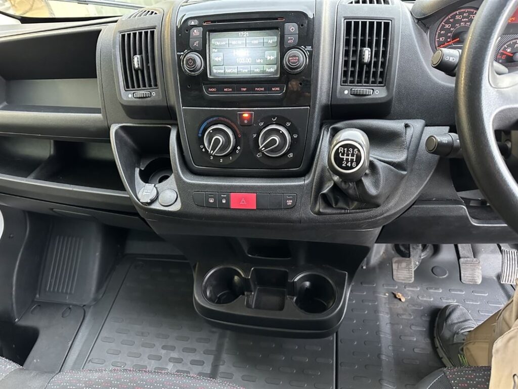 Peugeot Boxer L3H2 in White Centre Console with Headset, AC and Cup holders