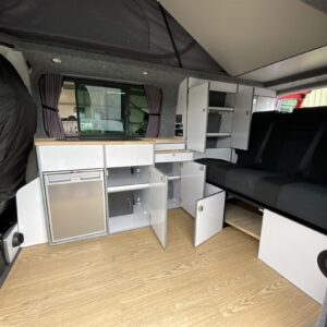 2020.07 VW T6 LWB Conversion Inside View with Storage Cupboards Open