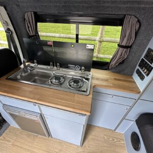 04.2024 Vauxhall Vivaro LWB Conversion Side Kitchen with Glass Lids Open on Sink/Hob