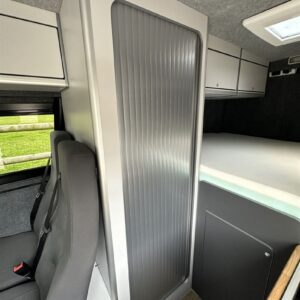 2024.04 VW Crafter MWB 2 Berth Conversion Washroom with Tambour Door