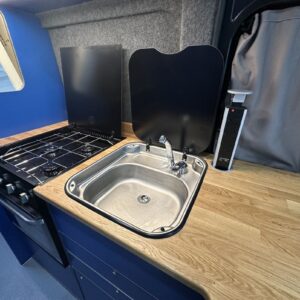 2025.06 Peugeot Boxer L3H2 Conversion Side Kitchen with Lid Open on Sink and Hob