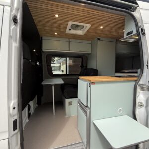 2025.08 MWB Sprinter Conversion Looking into Van through Open Sliding Door