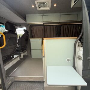 2025.07 MWB Sprinter Conversion Flip Up Table on Outside of Kitchen Unit